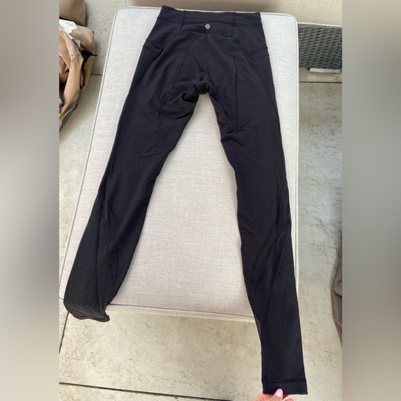 Black lululemon leggings, with mesh cut outs on bottom - Picture 3 of 5